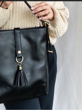 Elevate Black Leather convertible crossbody/backpack with tassel